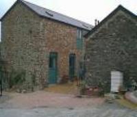 Barn and stables converted to four cottages and set in two acres of land near Totnes