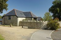 Detached converted cruciform barn for sale in village setting close to Dorchester
