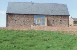 Brand new four bedroom barn conversion with approximately three quarters of an acre plot, with spectacular views over Monmouth and towards the Brecons and within commuting distance of Cardiff, Bristol and the Midlands