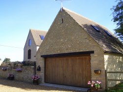 Converted Grade II listed stone barn in Upper Benefield, near Oundle in Northamptonshire