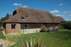 A four bedroom barn conversion near Petworth, West Sussex, with South Downs views