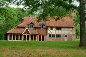 Farmhouse with outbuildings   near Guildford, Surrey