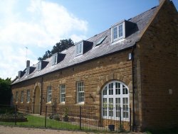 Former coach house and stable block conversion set within the grounds of Ecton Hall near Northampton in Northants