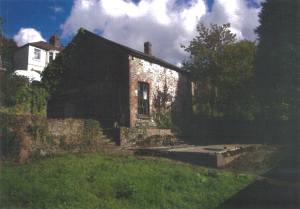 A coach house with planning permission for conversion in Port Talbot, Wales