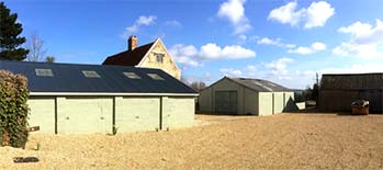 A Grade II listed house with barns for conversion in Merstone on the Isle of Wight