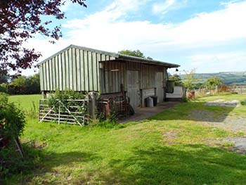 Equestrian property comprising an unconverted barn, stables and land near Exmoor, Devon