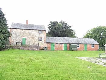 Farmhouse with a range of barns near Llanymynech in Powys