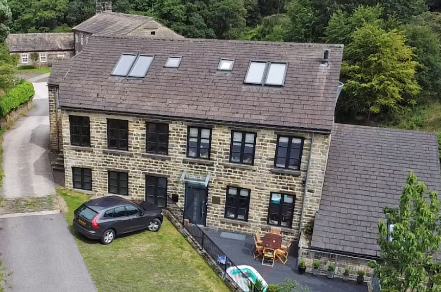 Partly converted former mill in the West Yorkshire countryside