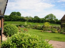 Converted brick barn with half an acre of garden in Knighton on Teme, near Tenbury Wells