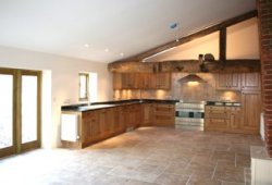 Four / five bedroom Grade II listed barn conversion set in about half an acre near Exeter, Devon