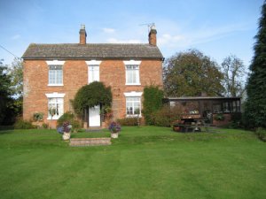 Farmhouse with range of barns near Solihull