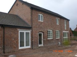 Four barns currently undergoing conversion in Chipnall, near Market Drayton, Shropshire
