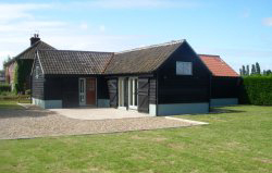 Two bedroom barn conversion set on a third of an acre in Thurne, near Norwich in Norfolk