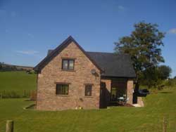 Four bedroom barn conversion set in a half acre plot in Upper Chapel, near Brecon, Powys